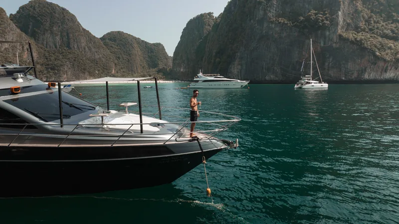 Hype anchored in Maya Bay, Phi Phi, with the limestone cliffs behind