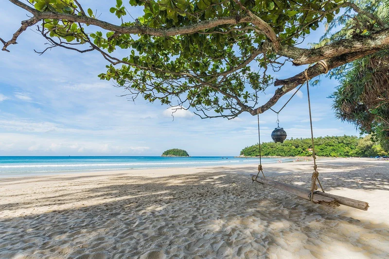 The tree swing on Kata beach, Koh Pu island offshore