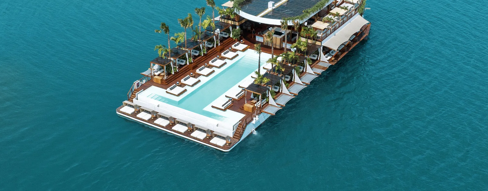 Yona Beach Club at sunset, moored off Phuket
